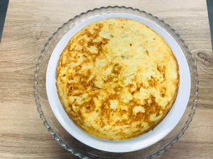 Porción tortilla + refresco de Aromas de Café